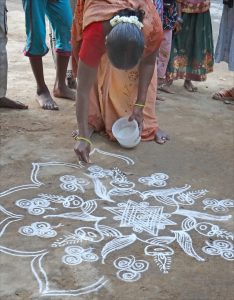 Kolam devant un temple rural Ganesh Patteeswaram Inde by dalbera is licensed under CC BY 2.0. 234x300 - Virgo Full Moon: devotion